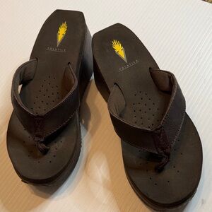 Volatile Black Platform Thong Sandals with Yellow Logo